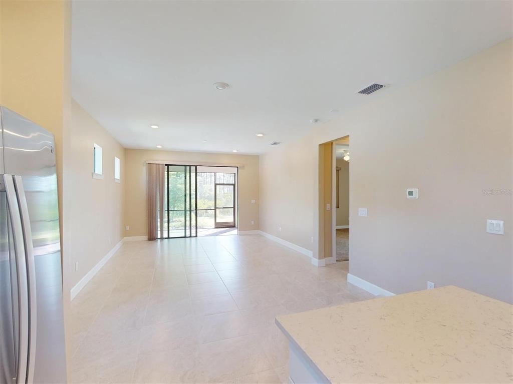 1352 Raspberry Dr Port North Port, FL 34289 - Photo 33 of 88 a view of a livingroom with an empty space and a window