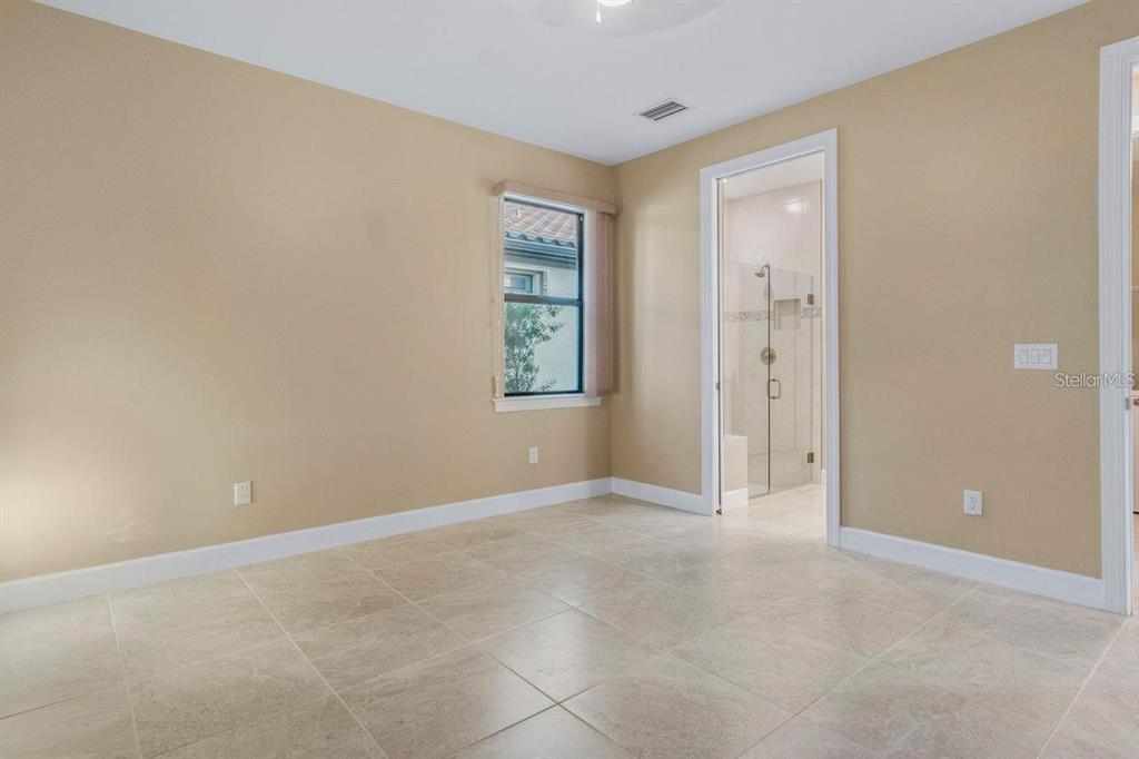 1352 Raspberry Dr Port North Port, FL 34289 - Photo 36 of 88 an empty room with windows and closet