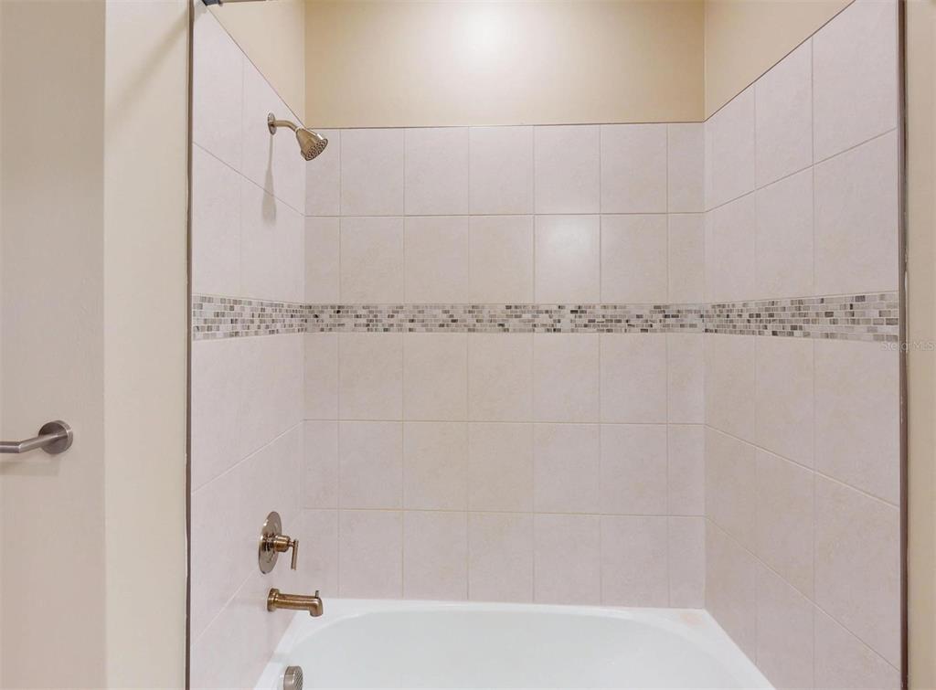 1352 Raspberry Dr Port North Port, FL 34289 - Photo 49 of 88 a bathroom with a shower and a shower