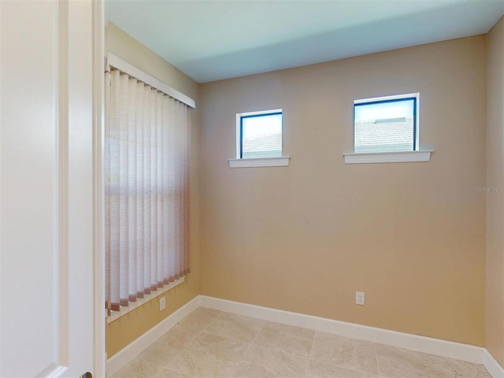 1352 Raspberry Dr Port North Port, FL 34289 - Photo 52 of 88 a view of an empty room with a window