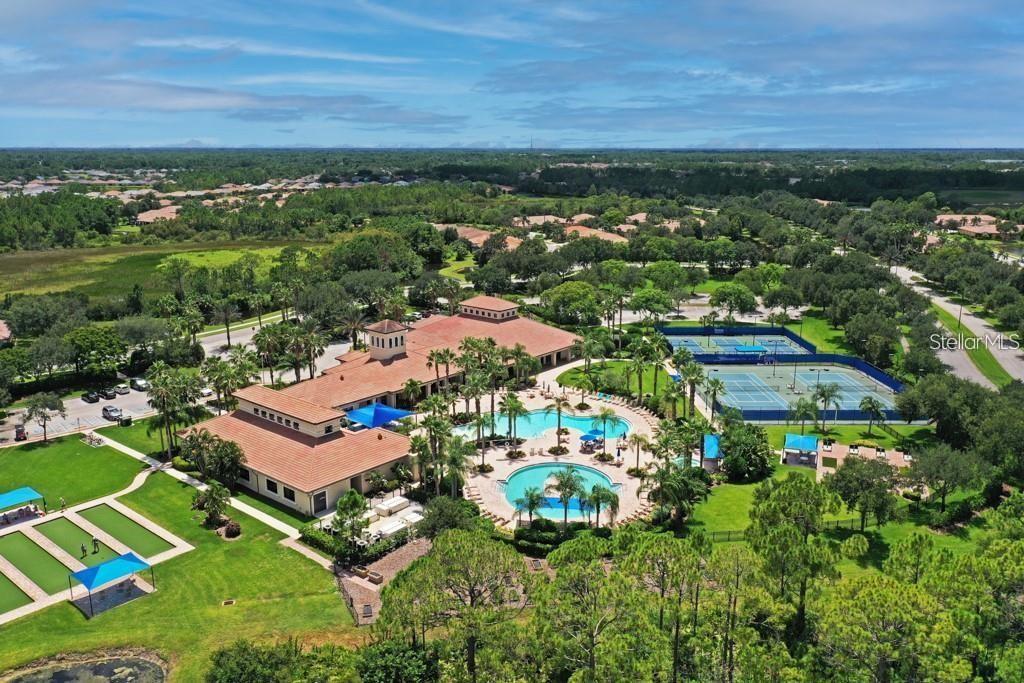 1352 Raspberry Dr Port North Port, FL 34289 - Photo 74 of 88 an aerial view of residential houses with outdoor space and trees