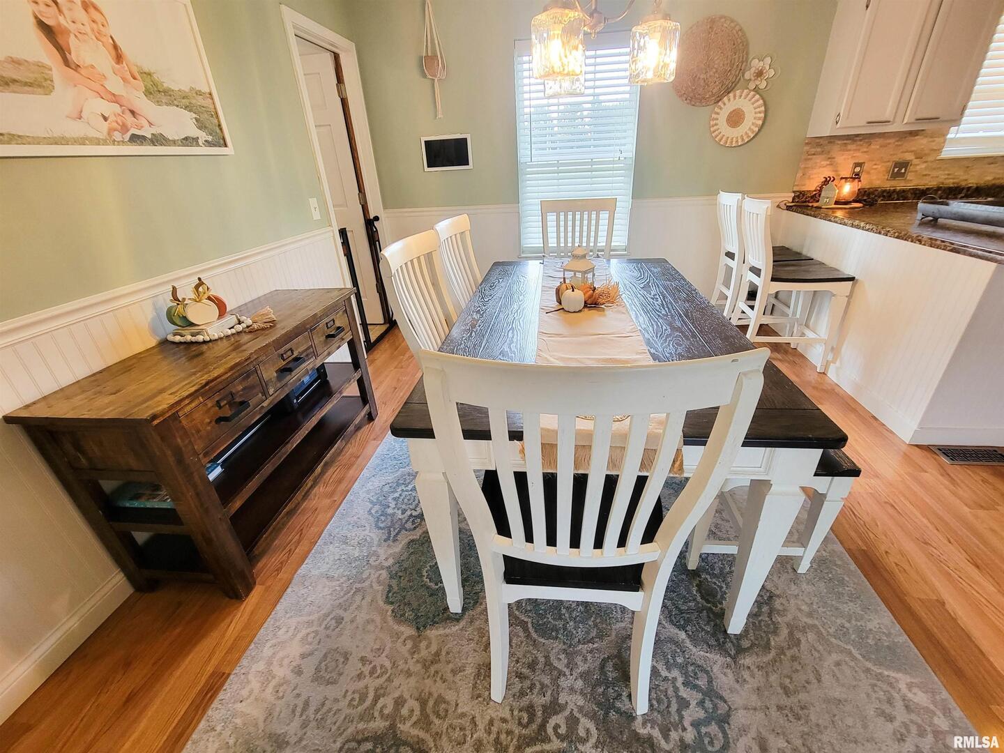 16 Stone Forge Pike Flora, IL 62839 - Photo 21 of 98 a view of a dining room with furniture and wooden floor
