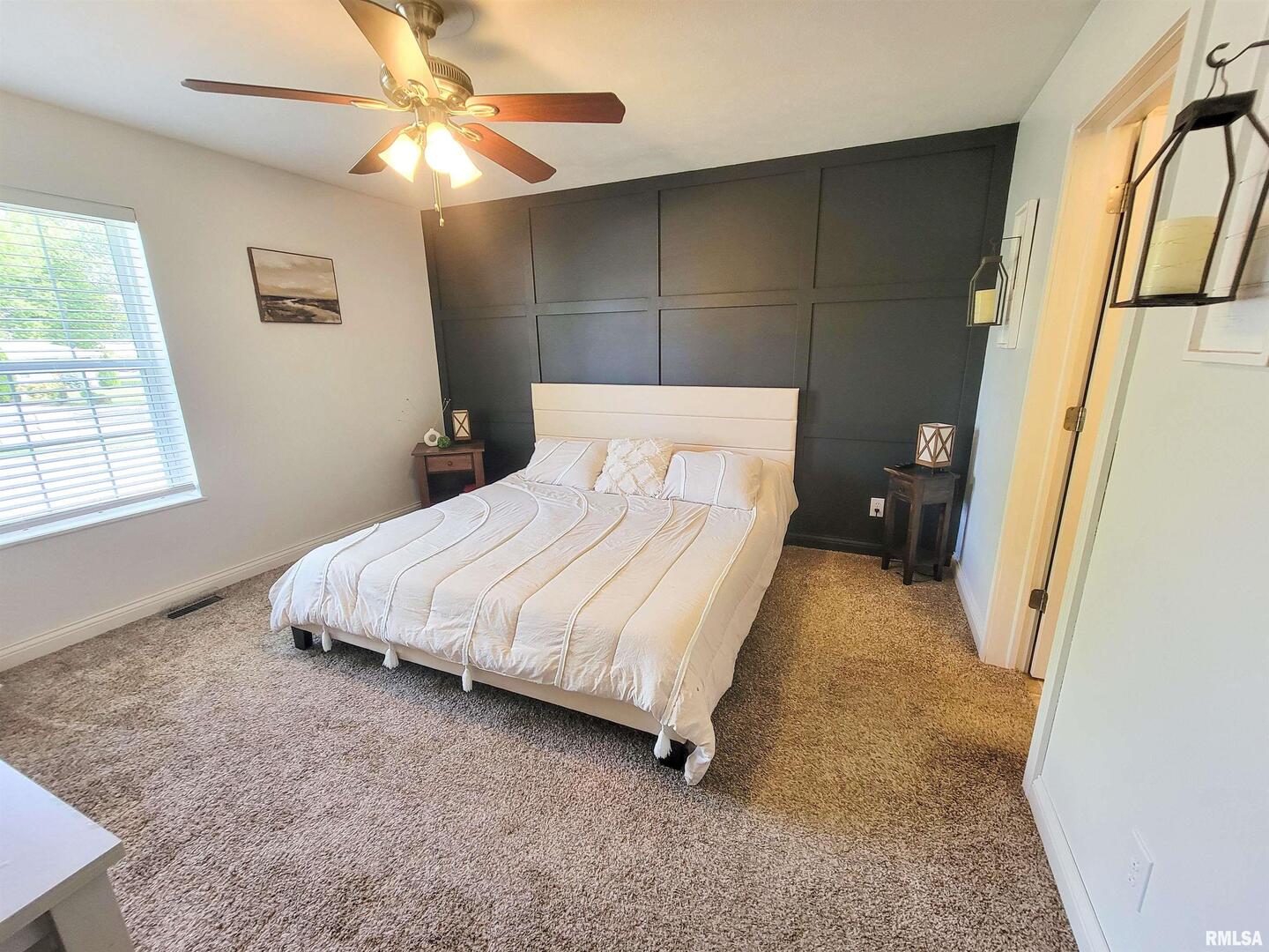 16 Stone Forge Pike Flora, IL 62839 - Photo 39 of 98 a bedroom with a bed and a chandelier