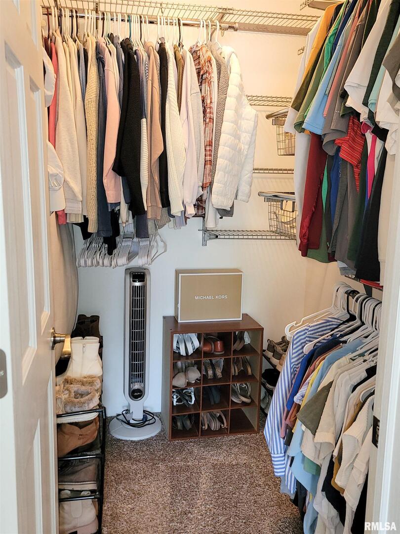 16 Stone Forge Pike Flora, IL 62839 - Photo 40 of 98 a view of walk in closet with clothes and shoes