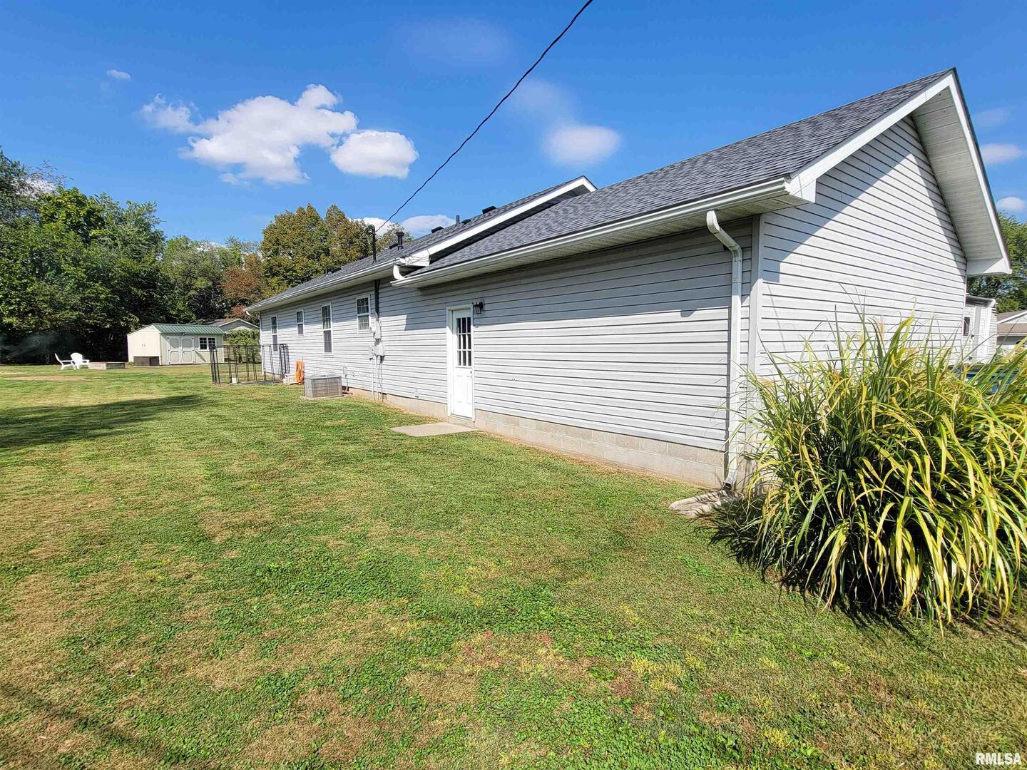 16 Stone Forge Pike Flora, IL 62839 - Photo 88 of 98 a house view with a backyard space