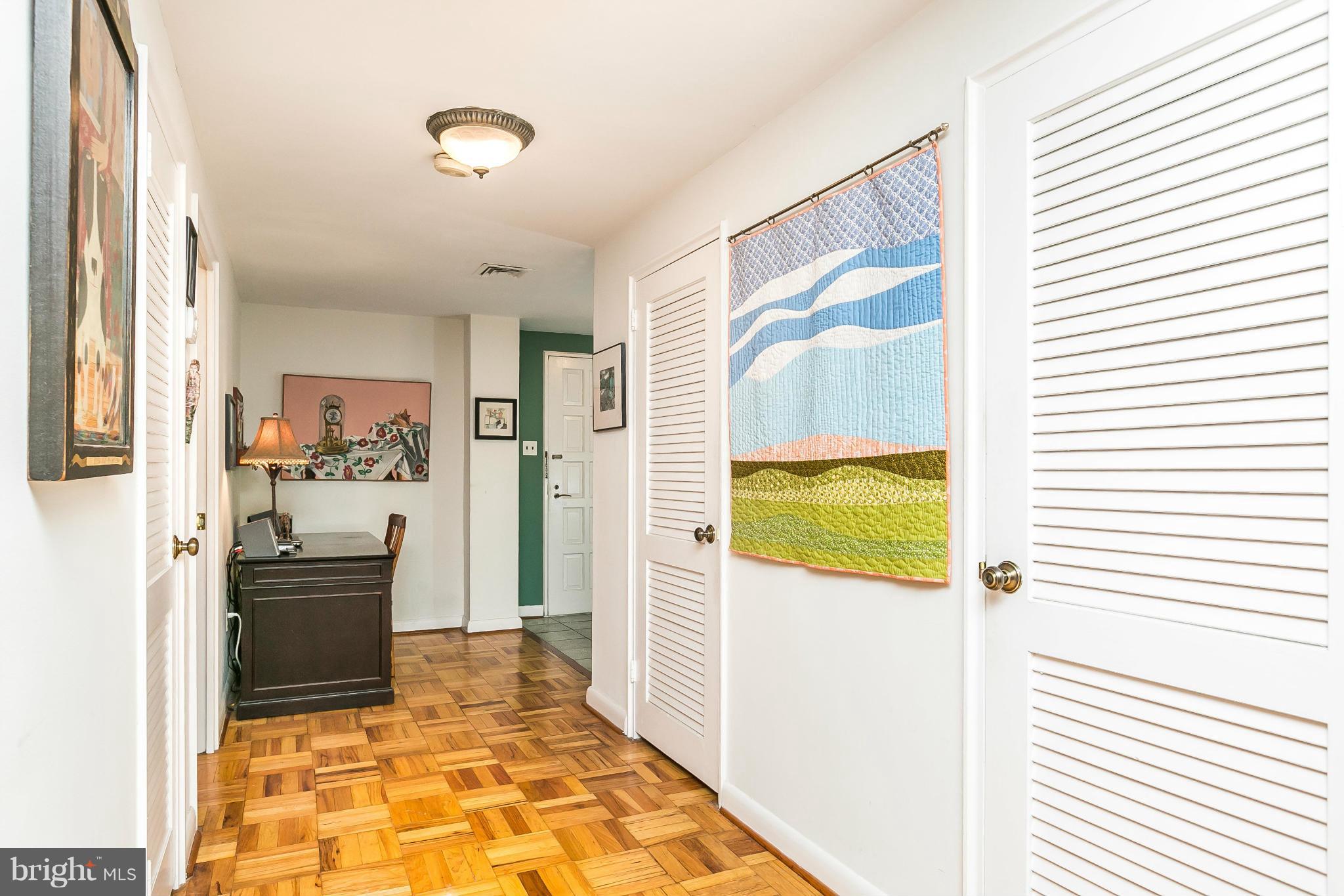 310 Ridgemede Road, Unit 107 Baltimore, MD 21210 - Photo 7 of 28 a bathroom with a tub and a view of bathroom