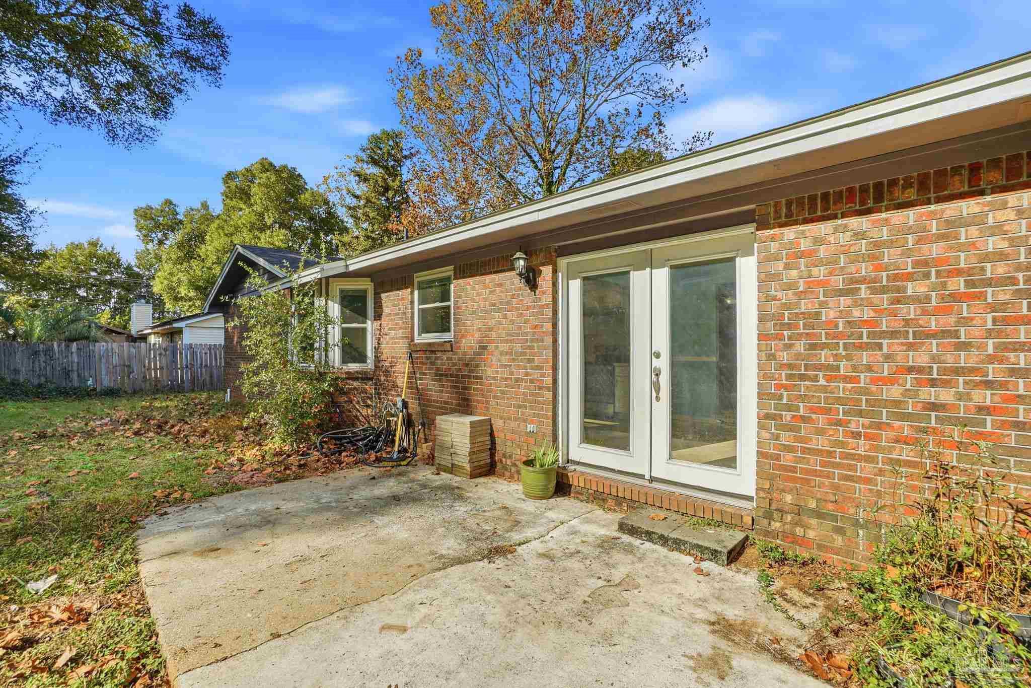 4605 Heatherwood Way Pace, FL 32571 - Photo 5 of 37 a view of a house with a backyard