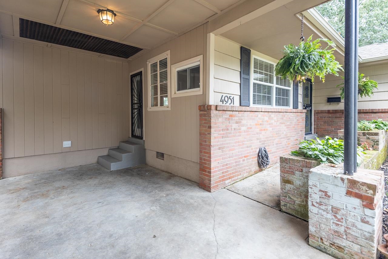4951 Sequoia Road Memphis, TN 38117 - Photo 20 of 21 a view of a house with a yard