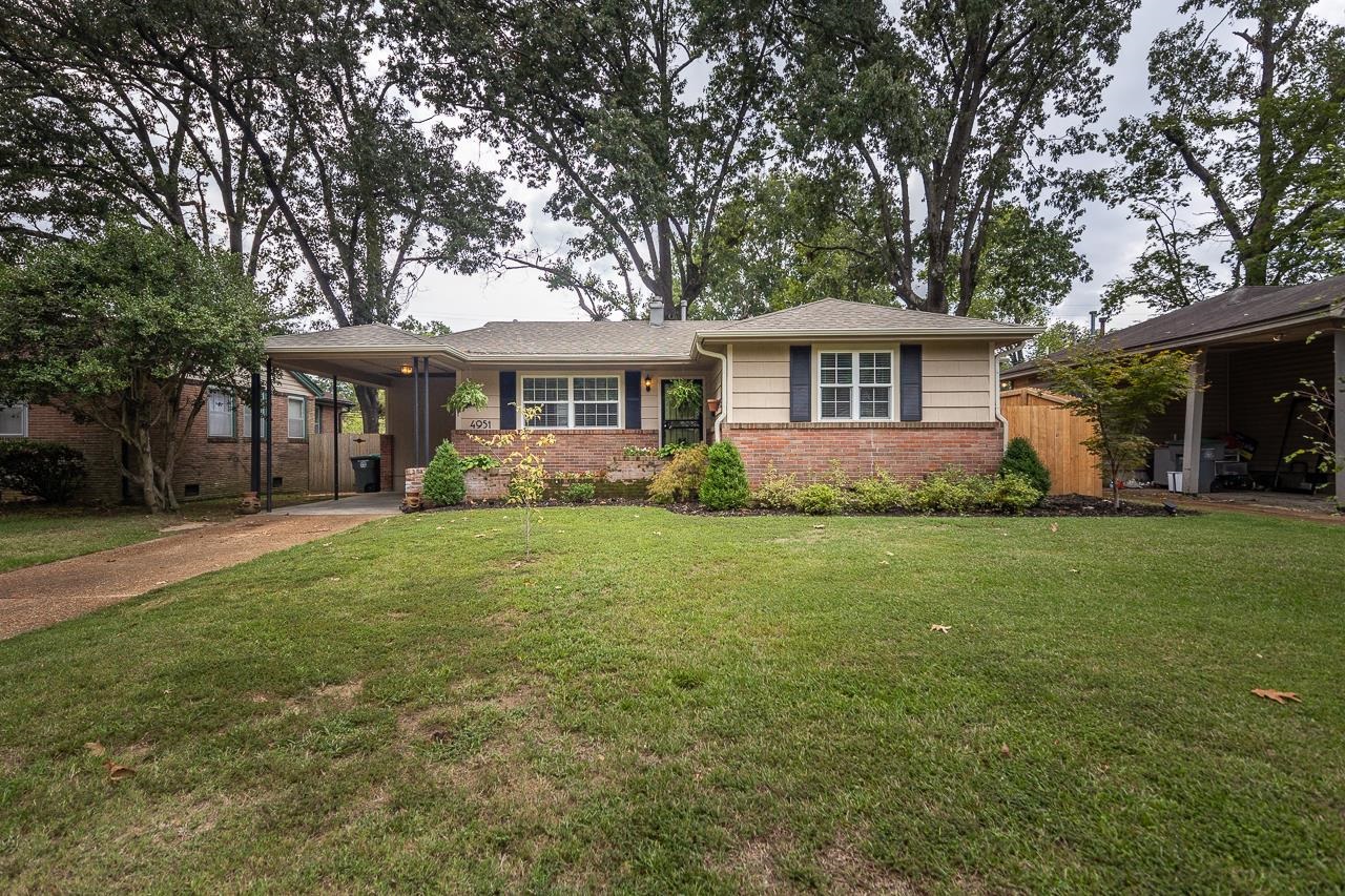 4951 Sequoia Road Memphis, TN 38117 - Photo 3 of 21 front view of a house with a yard