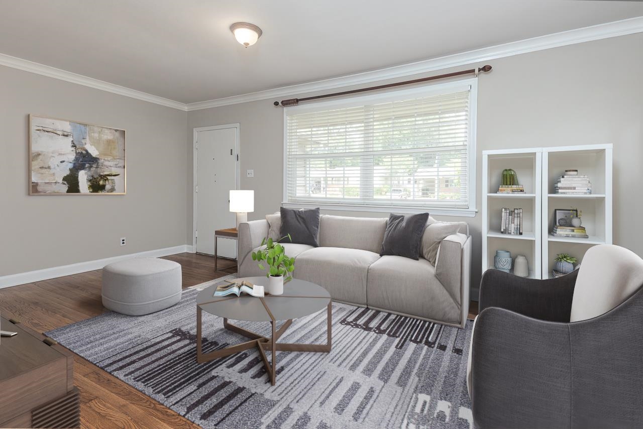 4951 Sequoia Road Memphis, TN 38117 - Photo 5 of 21 a living room with furniture and a large window