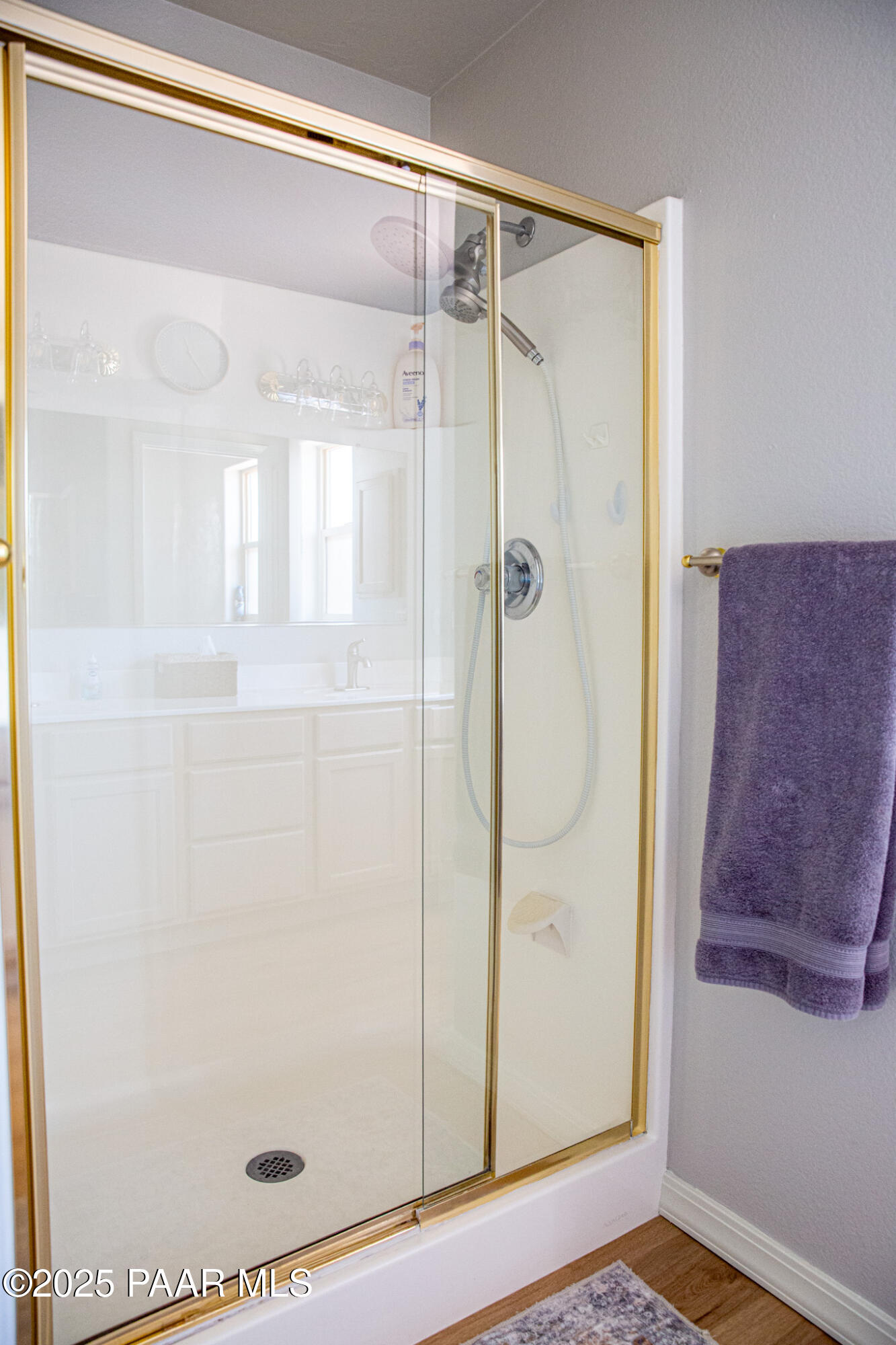 7075 Horizon Way Prescott Valley, AZ 86315 - Photo 28 of 44 a bathroom with a glass shower door