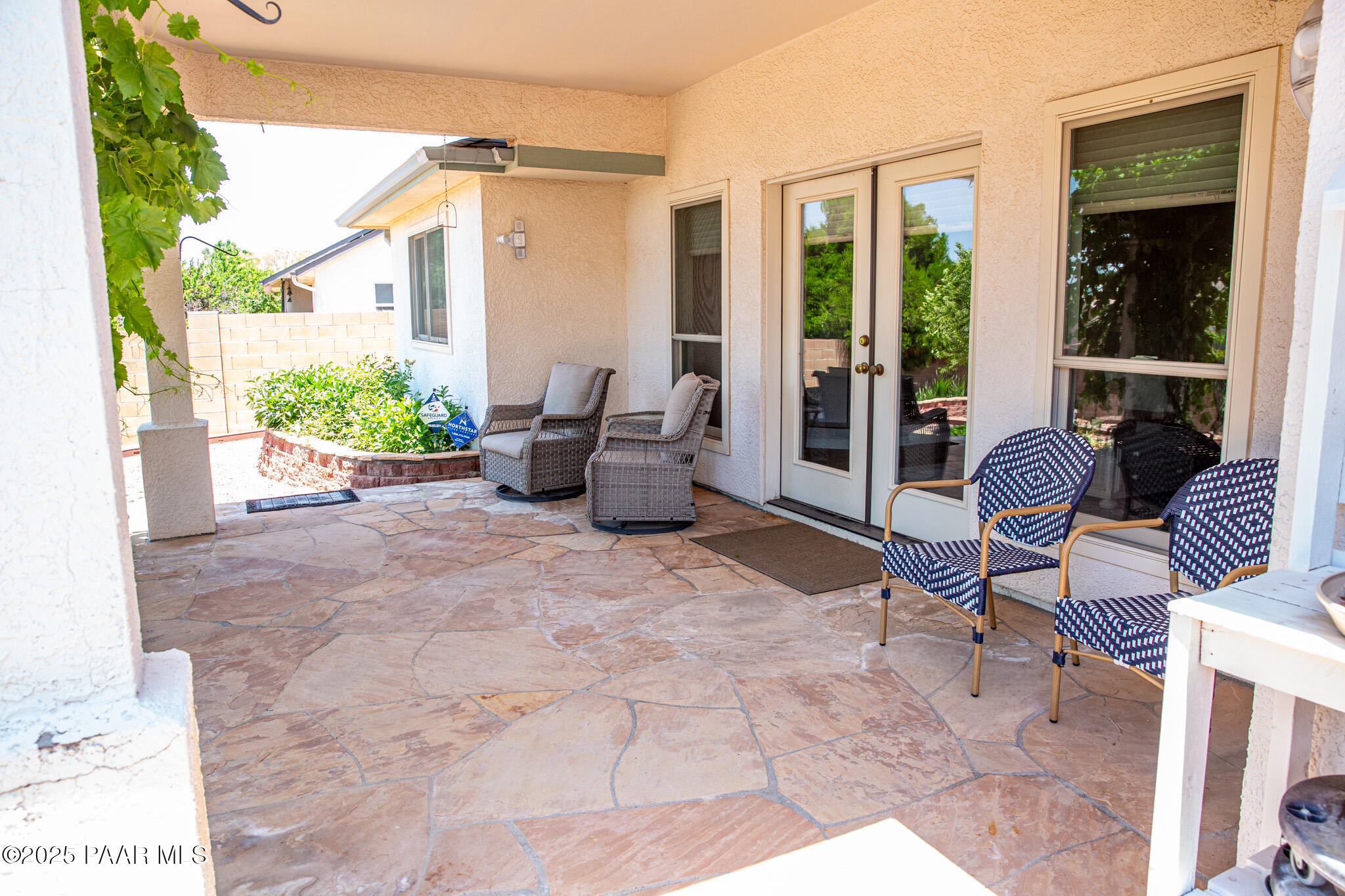 7075 Horizon Way Prescott Valley, AZ 86315 - Photo 39 of 44 a view of a patio with couches and a potted plant