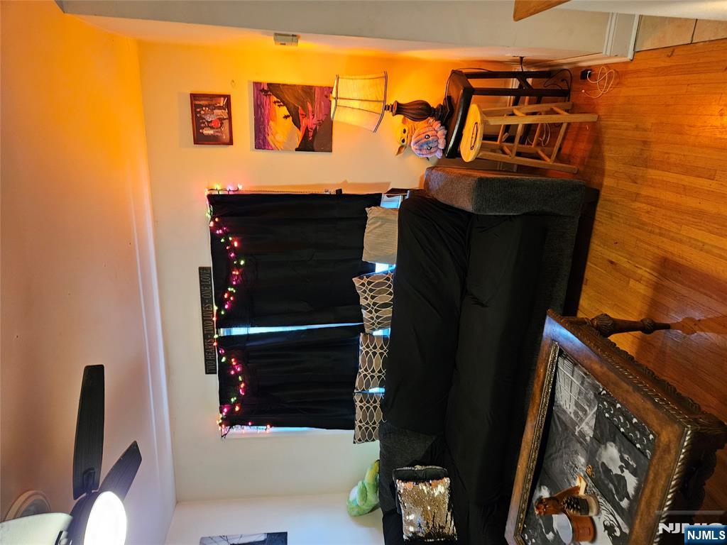 575 High Mountain Road, Unit 3 North Haledon, NJ 07508 - Photo 3 of 10 a living room with furniture and a fireplace