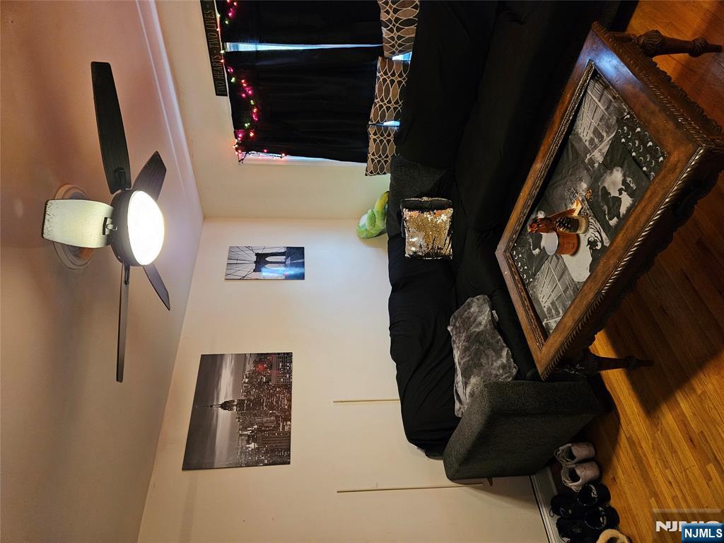 575 High Mountain Road, Unit 3 North Haledon, NJ 07508 - Photo 4 of 10 a living room with furniture and a rug