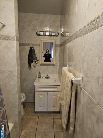 a bathroom with a sink and toilet