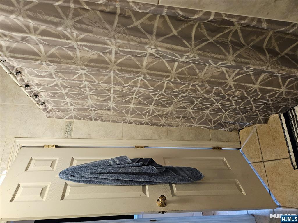 575 High Mountain Road, Unit 3 North Haledon, NJ 07508 - Photo 10 of 10 a bathroom with a shower and a toilet