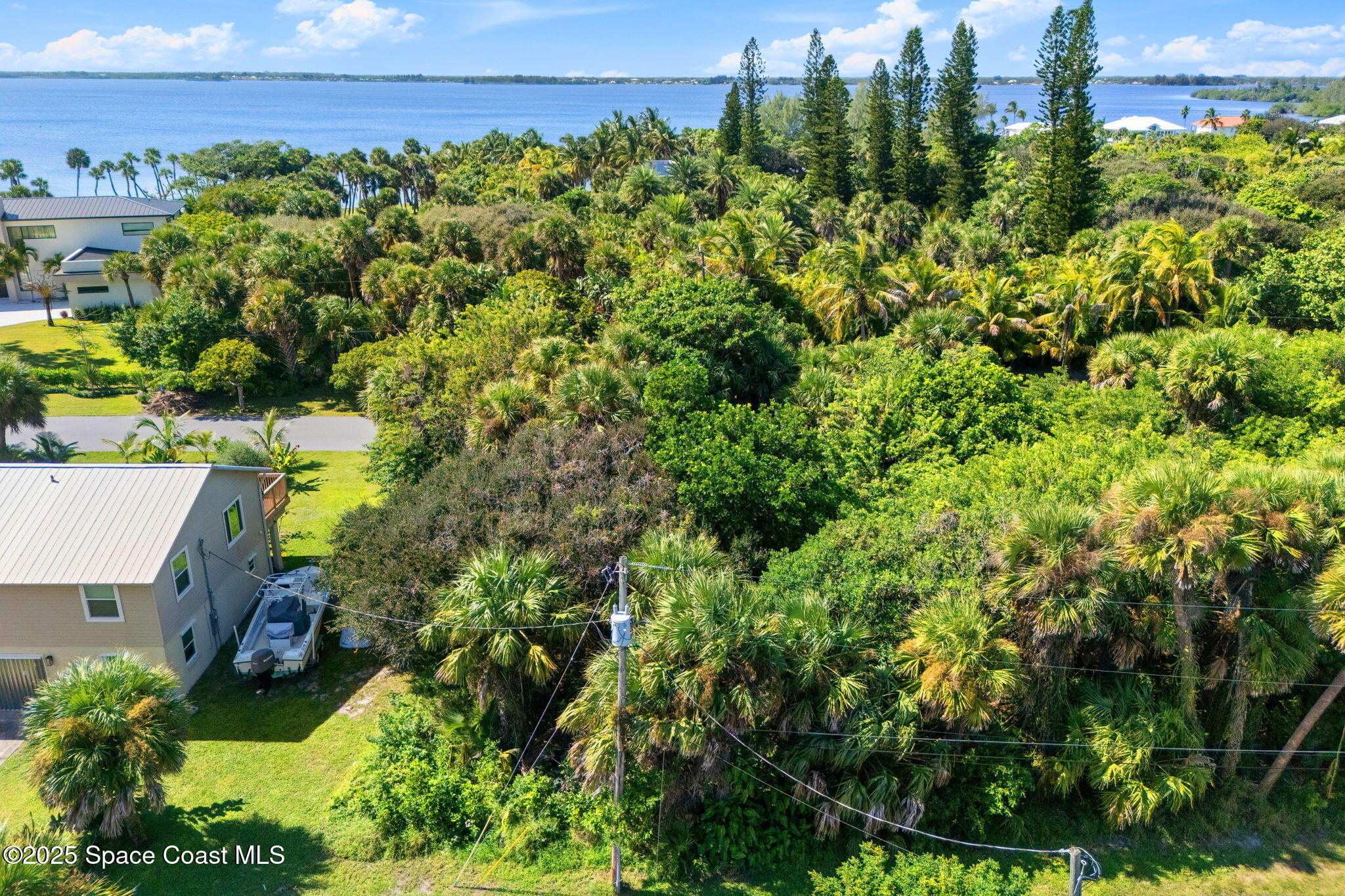 Tbd Tbd Winona Road Melbourne Beach, FL 32951 - Photo 20 of 25 a view of a garden with houses