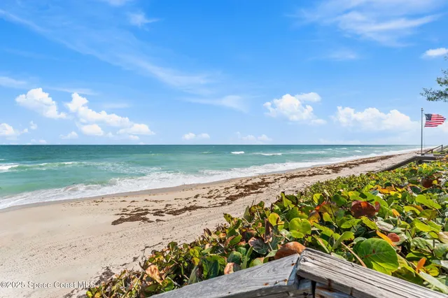 a view of swimming pool with a yard