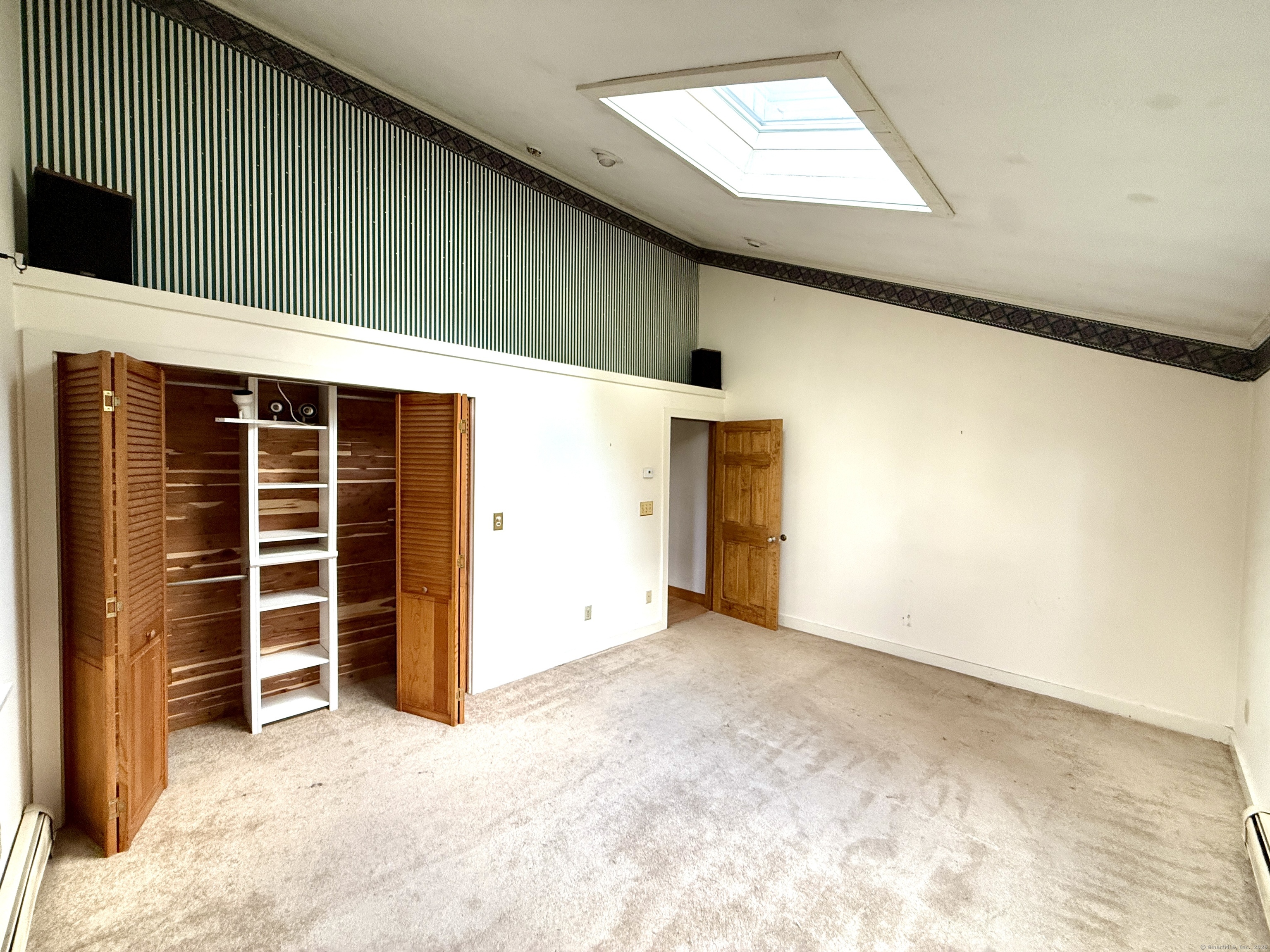 102 Krapf Road Ashford, CT 06278 - Photo 18 of 30 a view of an empty room with a window