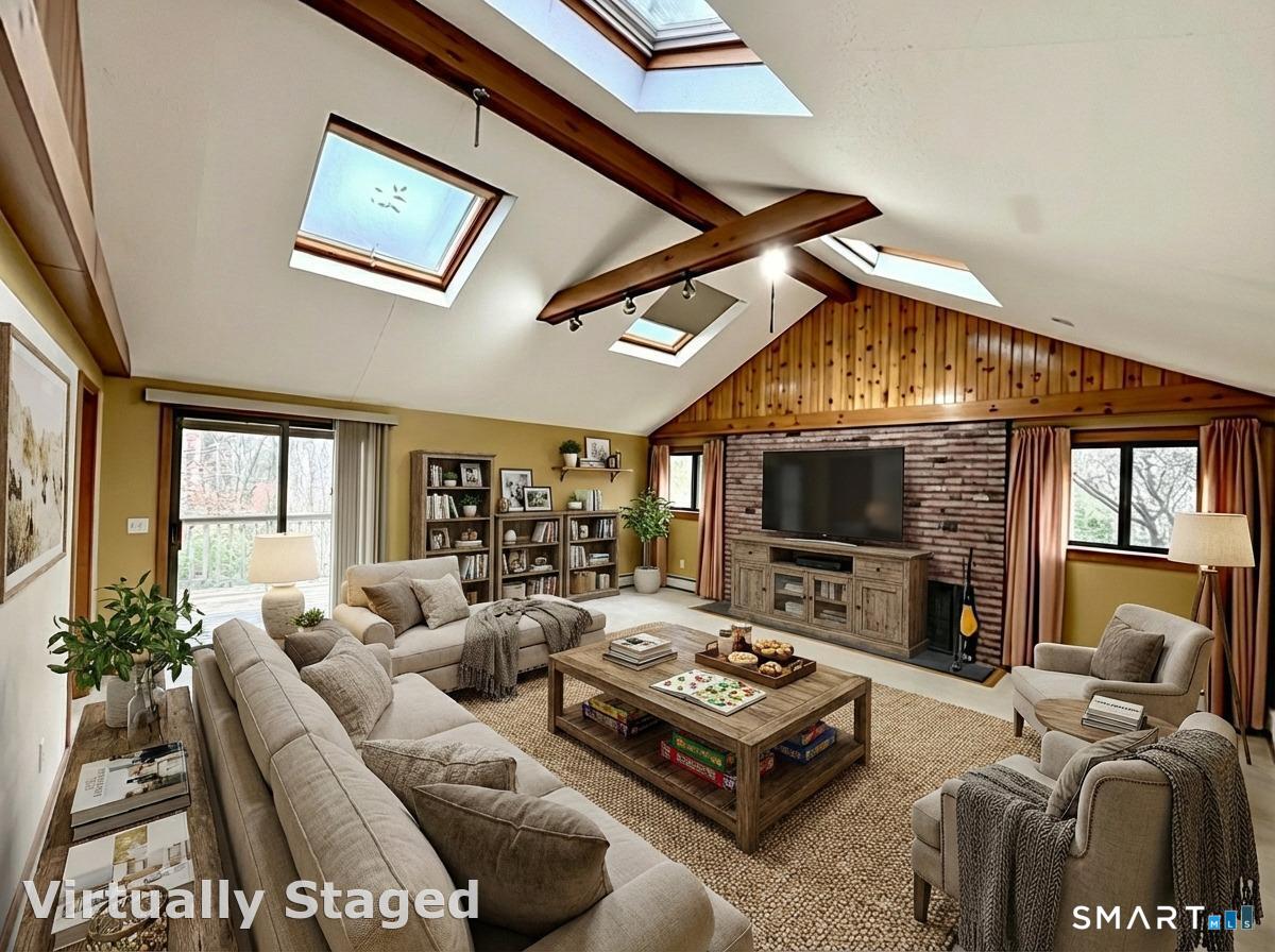 102 Krapf Road Ashford, CT 06278 - Photo 20 of 39 a living room with furniture a flat screen tv and a fireplace