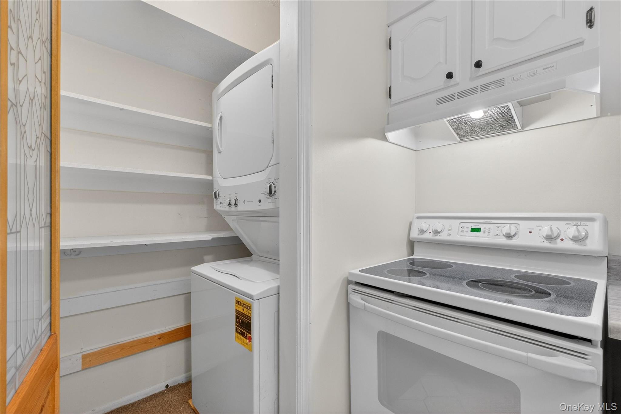 26 Cooper Road, Unit 715 Poughkeepsie, NY 12603 - Photo 18 of 30 a utility room with dryer and washer