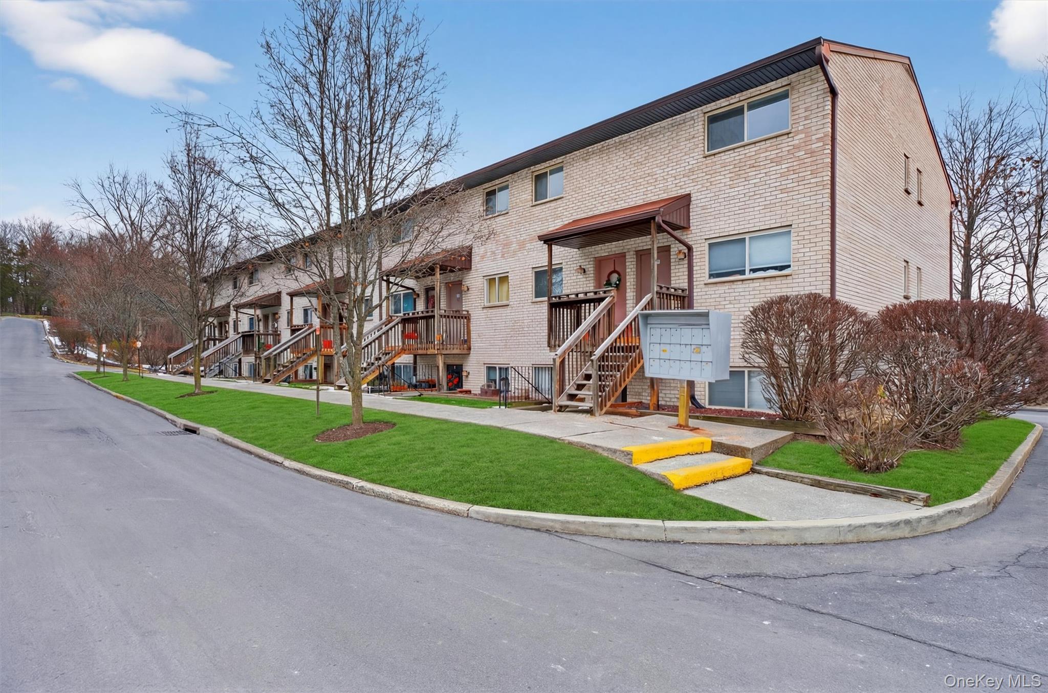 26 Cooper Road, Unit 715 Poughkeepsie, NY 12603 - Photo 6 of 30 View of apartment building / complex featuring stairway
