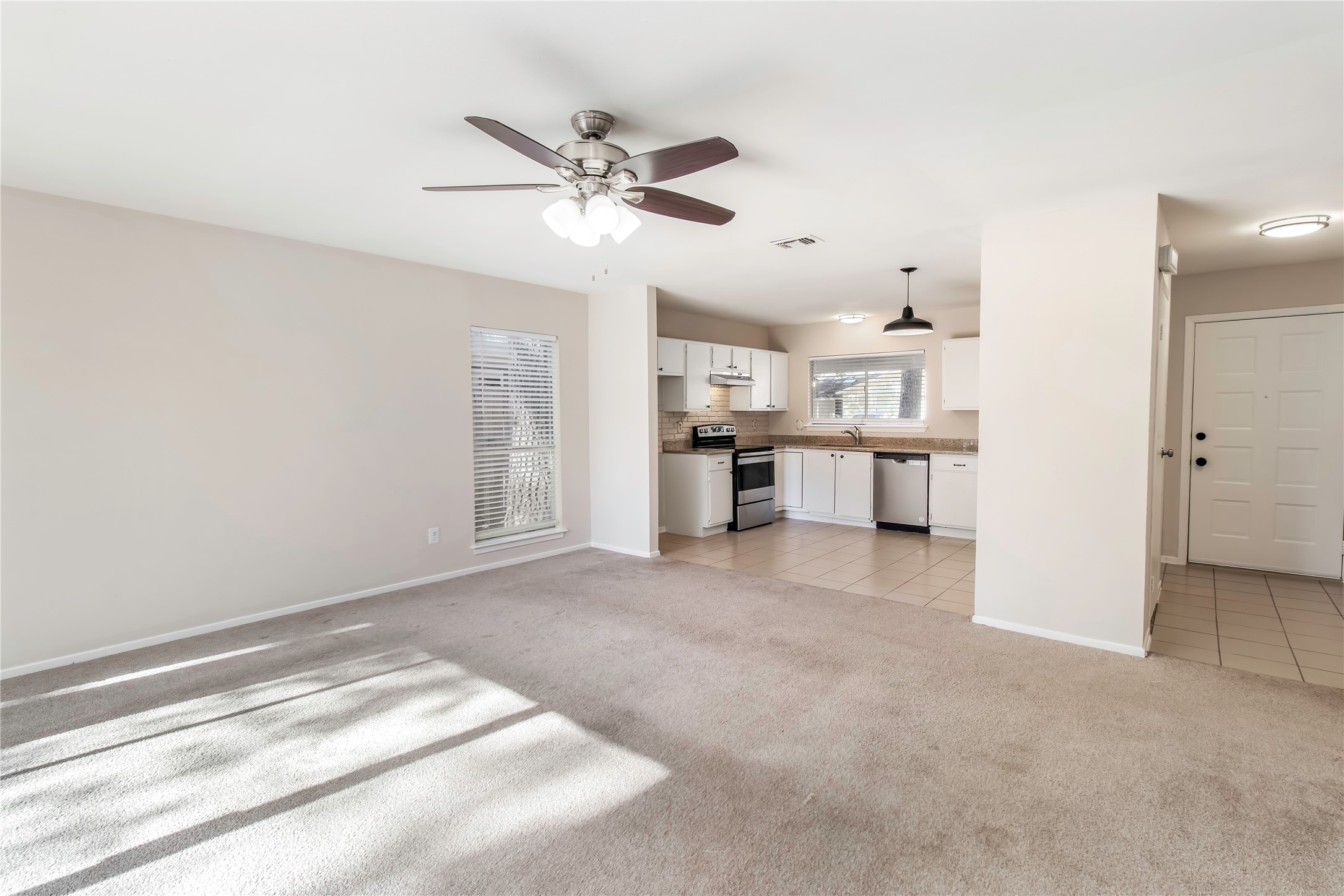 6 Red Deer Lane Spring, TX 77380 - Photo 13 of 24 a view of a kitchen with a sink and a kitchen