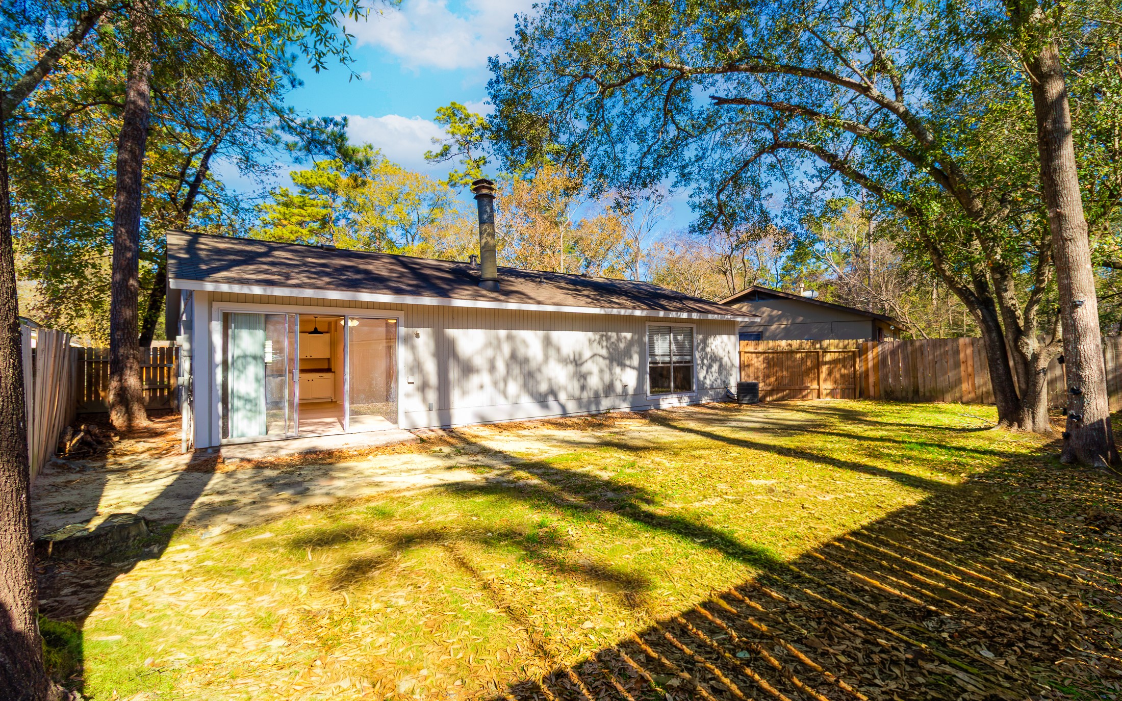 6 Red Deer Lane Spring, TX 77380 - Photo 23 of 24 a view of a house with a swimming pool