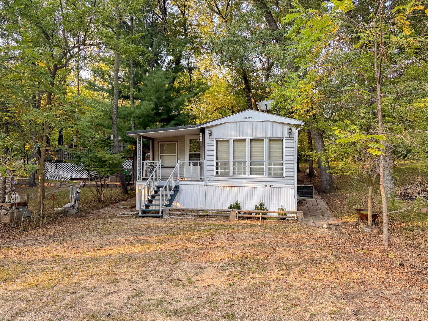 21-197 Woodhaven Sublette, IL 61367 - Photo 2 of 20 a view of a house with backyard porch and sitting area