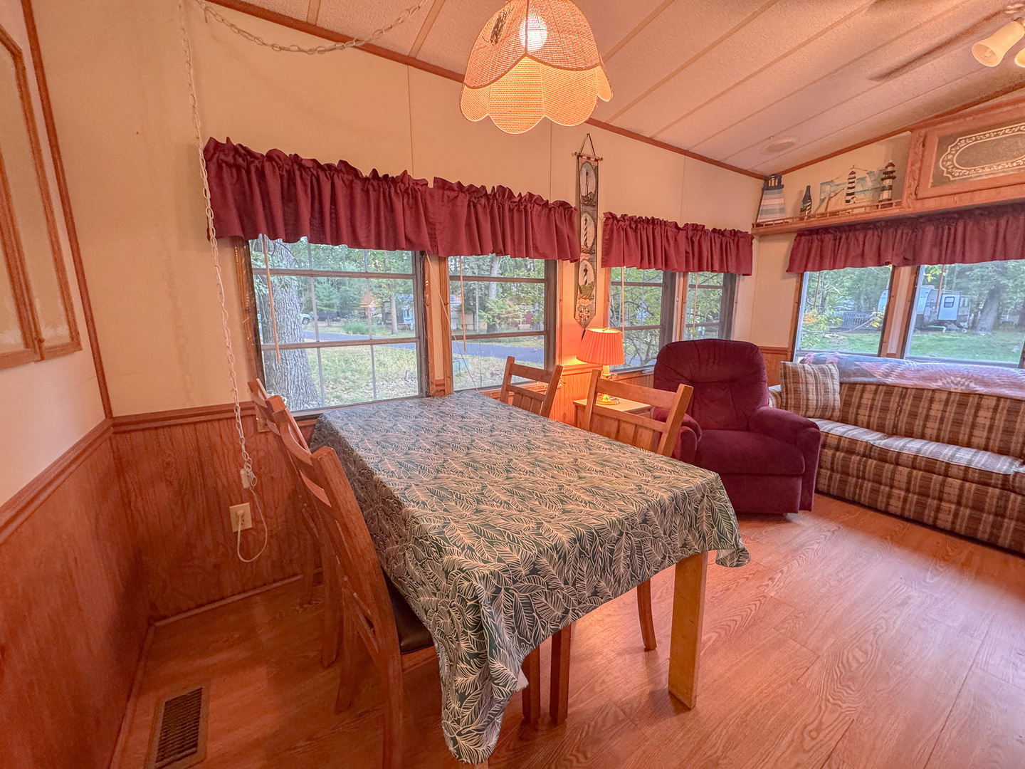 21-197 Woodhaven Sublette, IL 61367 - Photo 9 of 20 a outdoor sitting area with furniture and wooden floor