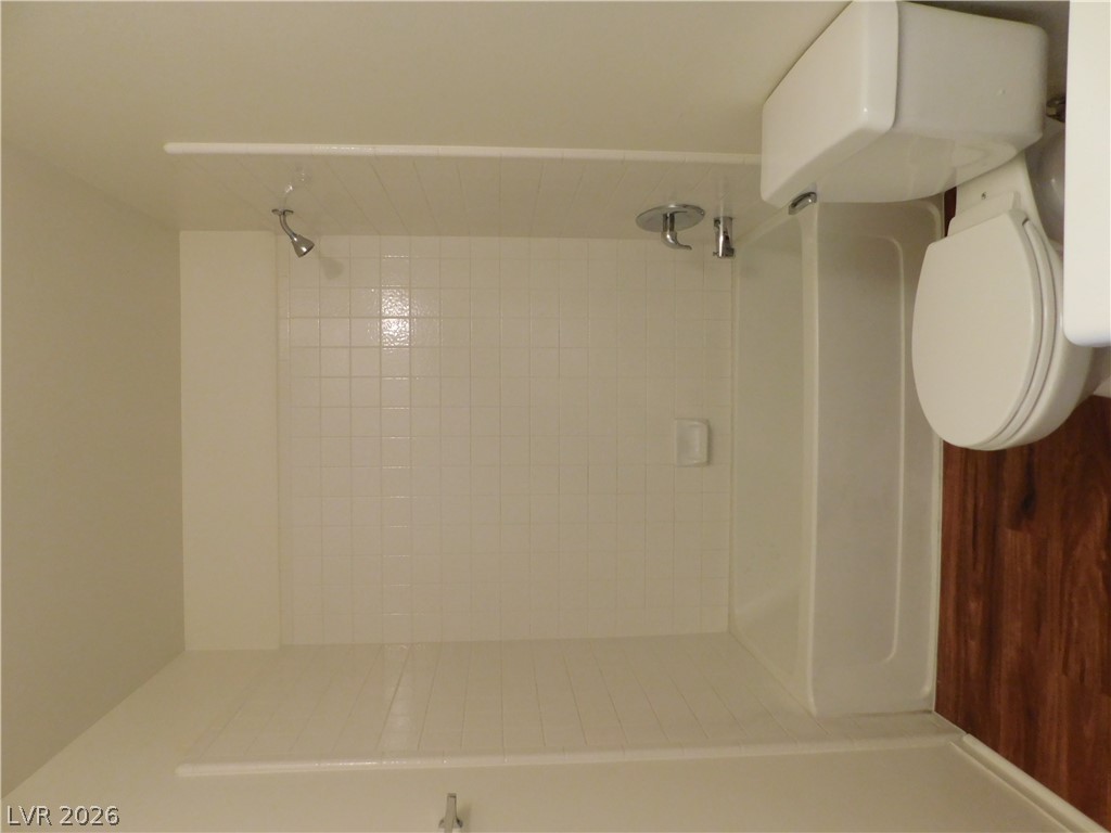 5221 South Lindell Road, Unit 202 Las Vegas, NV 89118 - Photo 25 of 28 A well-maintained full bathroom provides comfort and practicality.