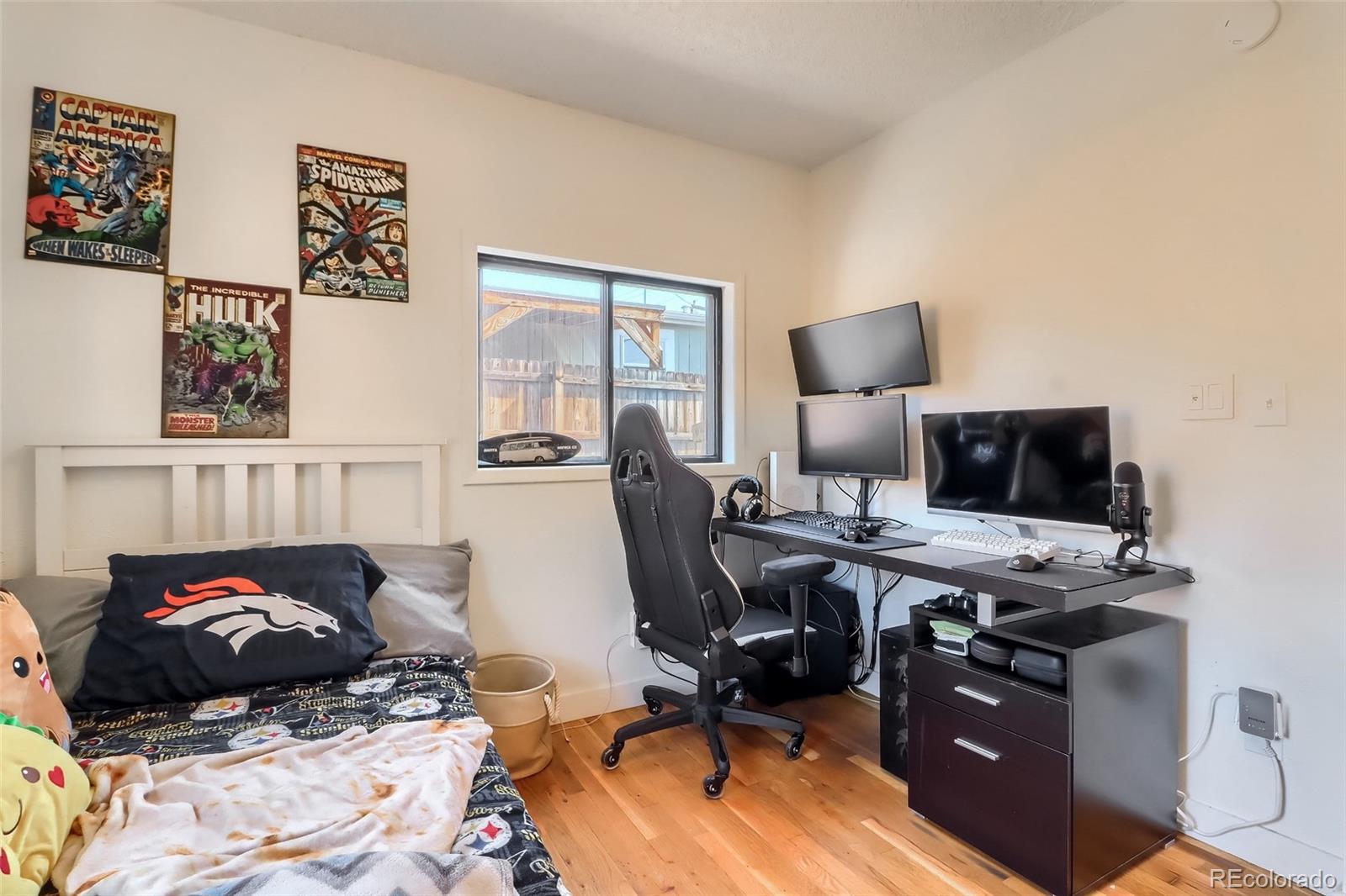 4175 West Custer Place Denver, CO 80219 - Photo 28 of 38 a bedroom with a workspace