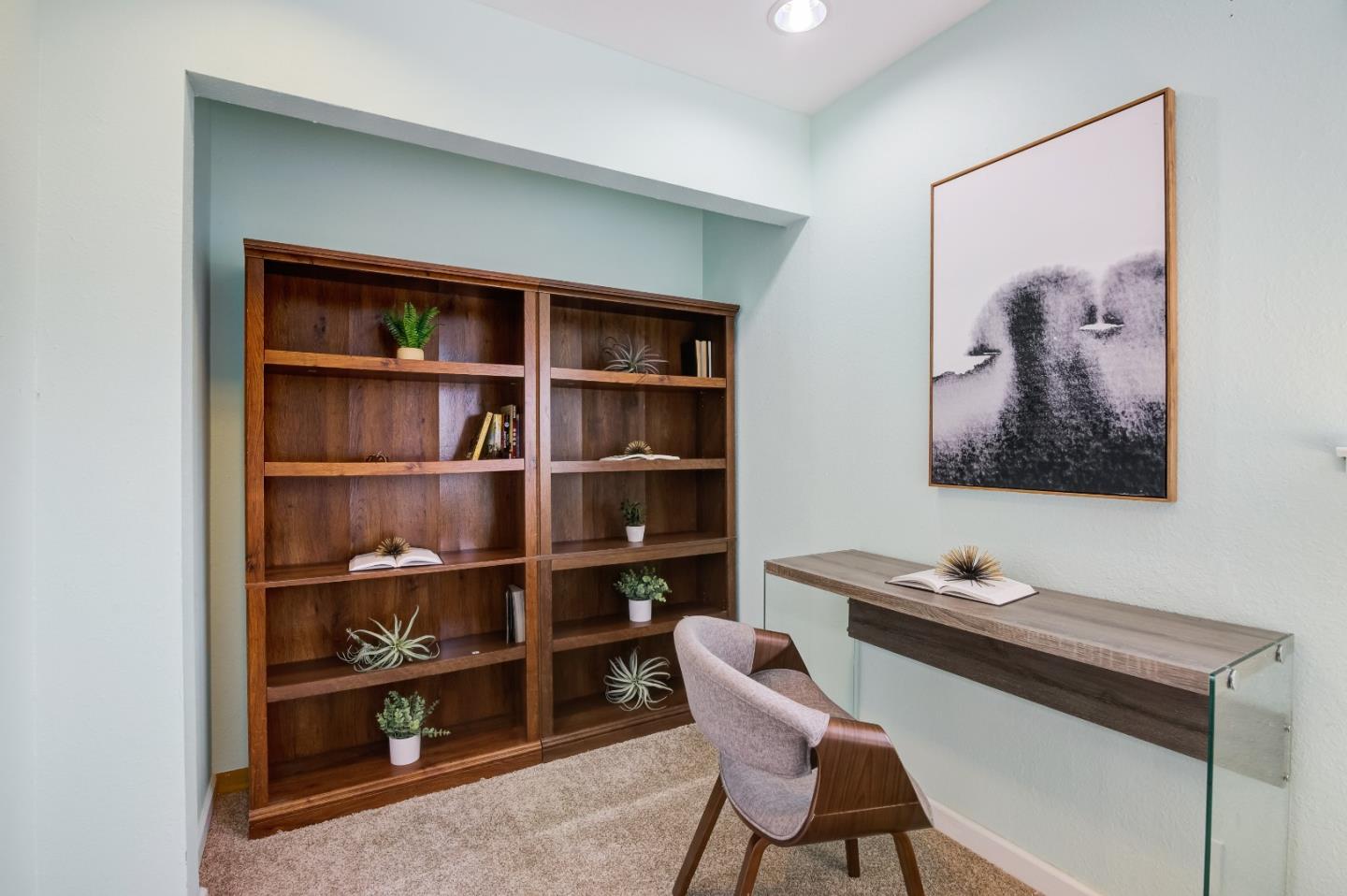 1224 Glacier Drive Milpitas, CA 95035 - Photo 14 of 45 a workspace with a bookshelf