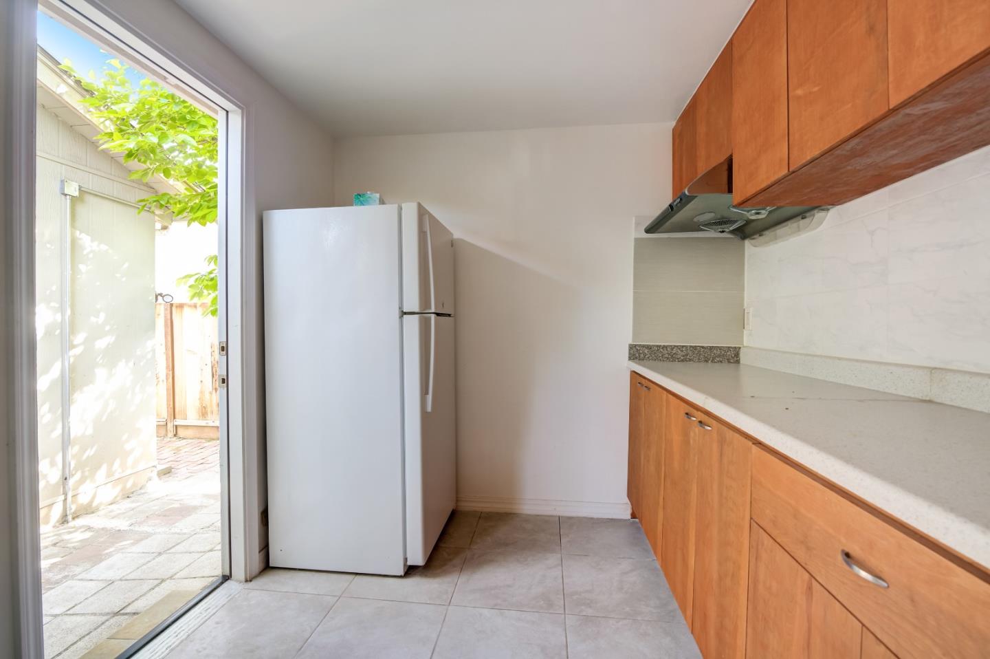 1224 Glacier Drive Milpitas, CA 95035 - Photo 24 of 45 a view of a kitchen with appliances and a window