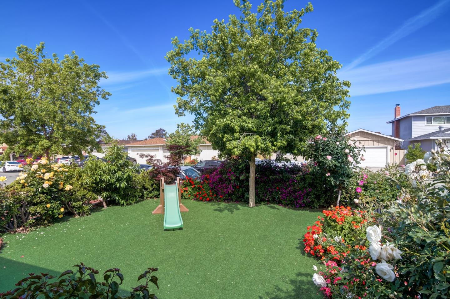 1224 Glacier Drive Milpitas, CA 95035 - Photo 34 of 45 a green field with flowers and trees