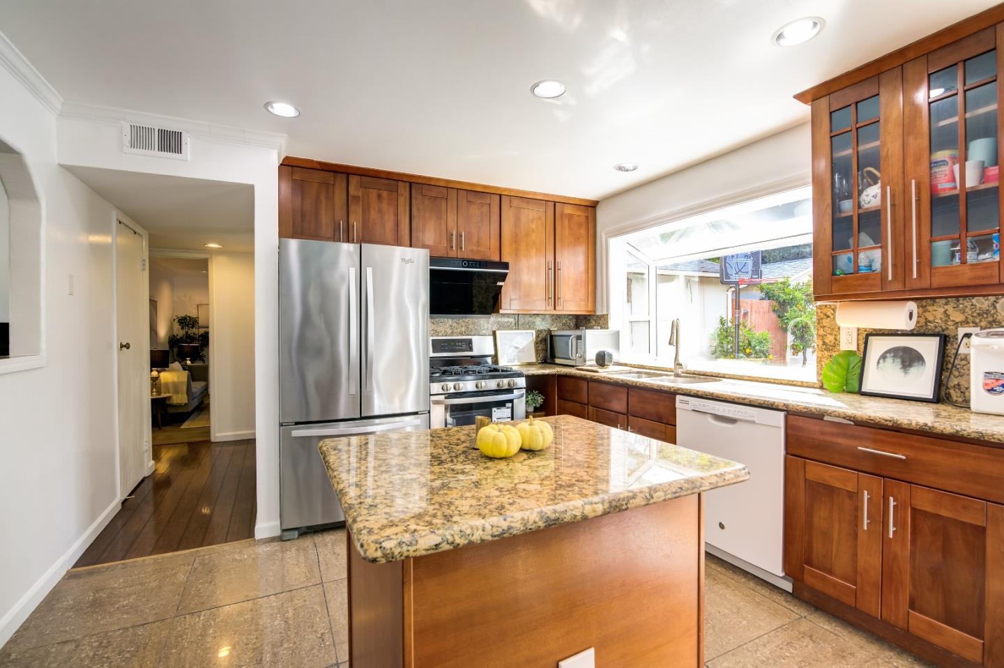 1224 Glacier Drive Milpitas, CA 95035 - Photo 6 of 45 a kitchen with a refrigerator and a sink
