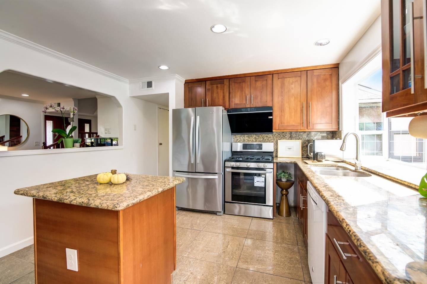 1224 Glacier Drive Milpitas, CA 95035 - Photo 7 of 45 a kitchen with stainless steel appliances granite countertop a sink stove and refrigerator