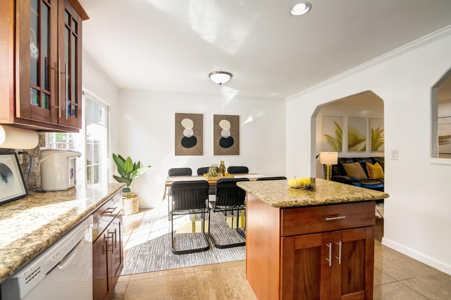 1224 Glacier Drive Milpitas, CA 95035 - Photo 8 of 45 a living room with granite countertop furniture a granite counter top and a potted plant