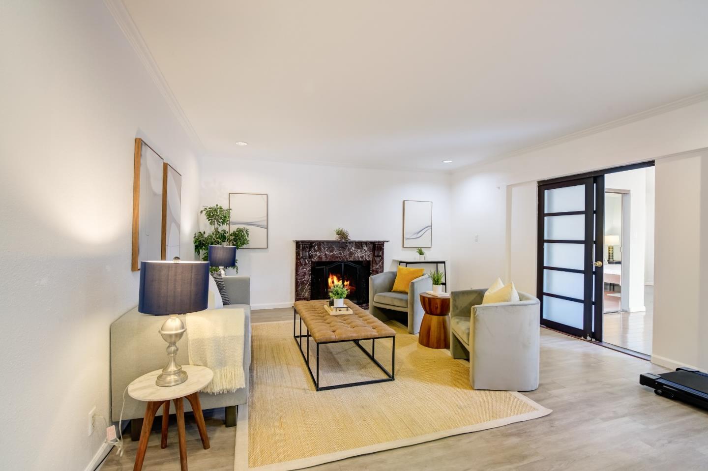 1224 Glacier Drive Milpitas, CA 95035 - Photo 9 of 45 a living room with furniture a rug and white walls