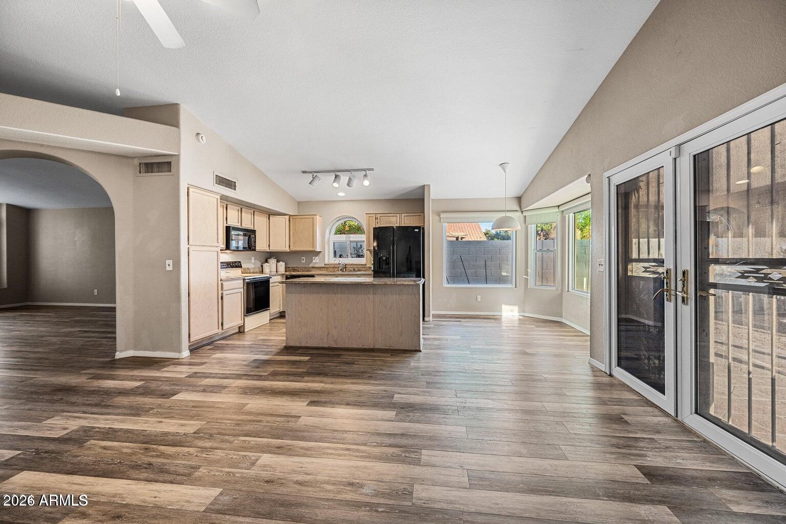 473 West Smoke Tree Road Gilbert, AZ 85233 - Photo 12 of 43 a view of a kitchen with wooden floor