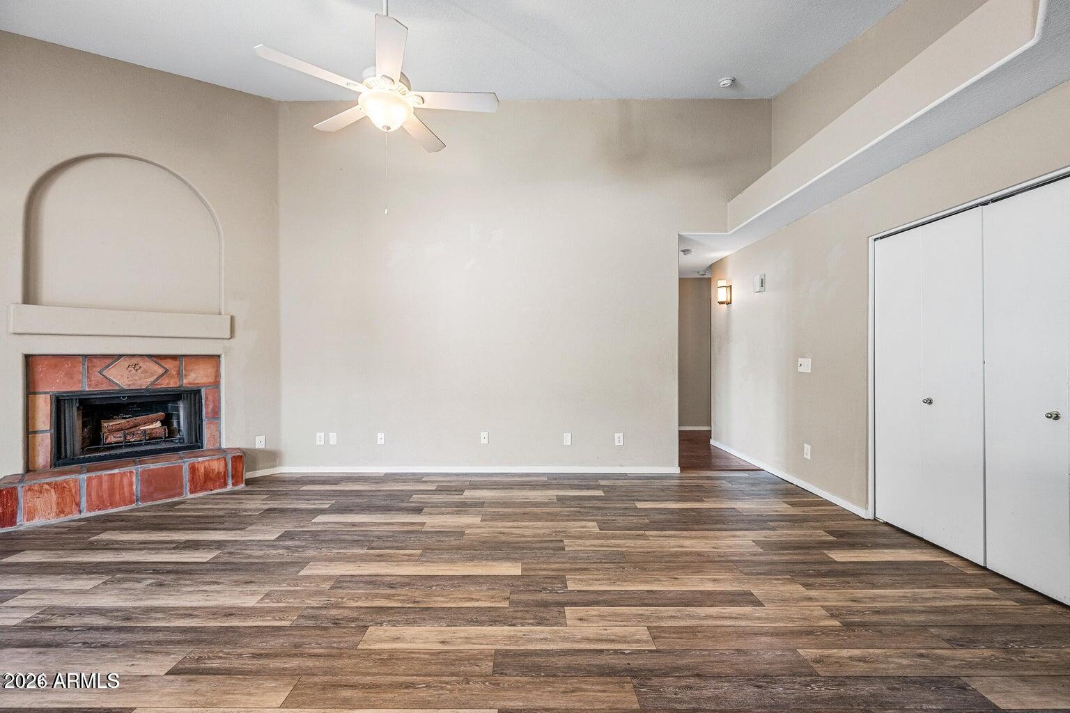 473 West Smoke Tree Road Gilbert, AZ 85233 - Photo 20 of 43 a view of an empty room with window and a fireplace