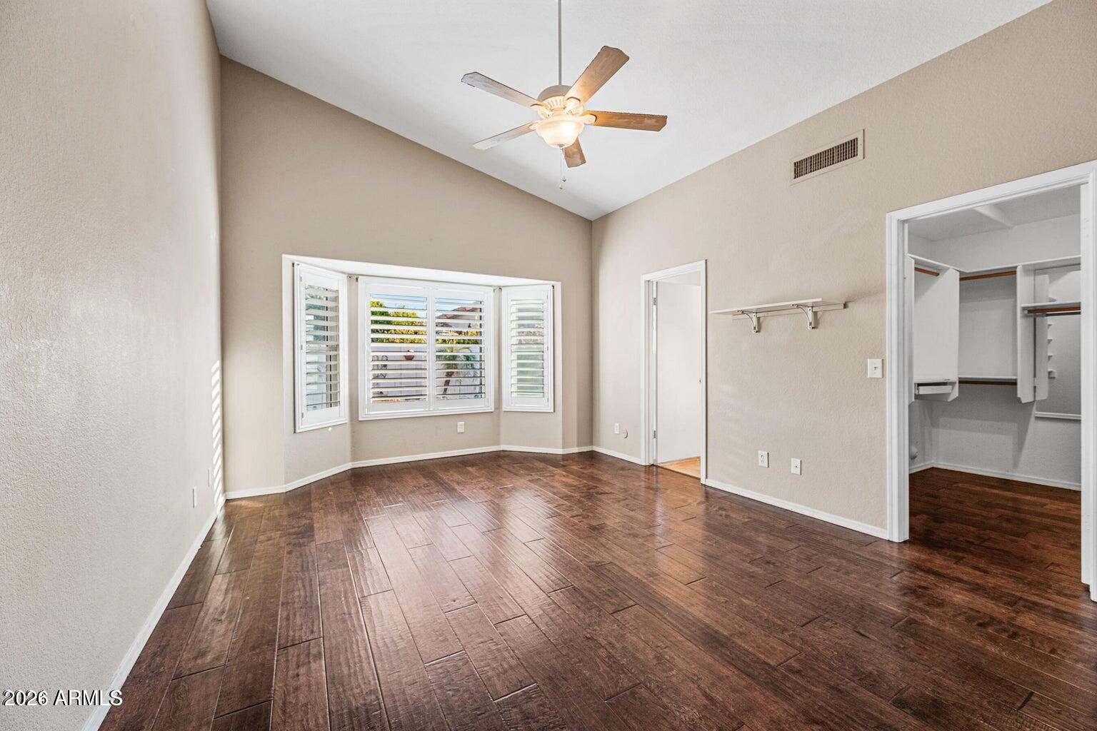 473 West Smoke Tree Road Gilbert, AZ 85233 - Photo 22 of 43 a view of an empty room with window and wooden floor
