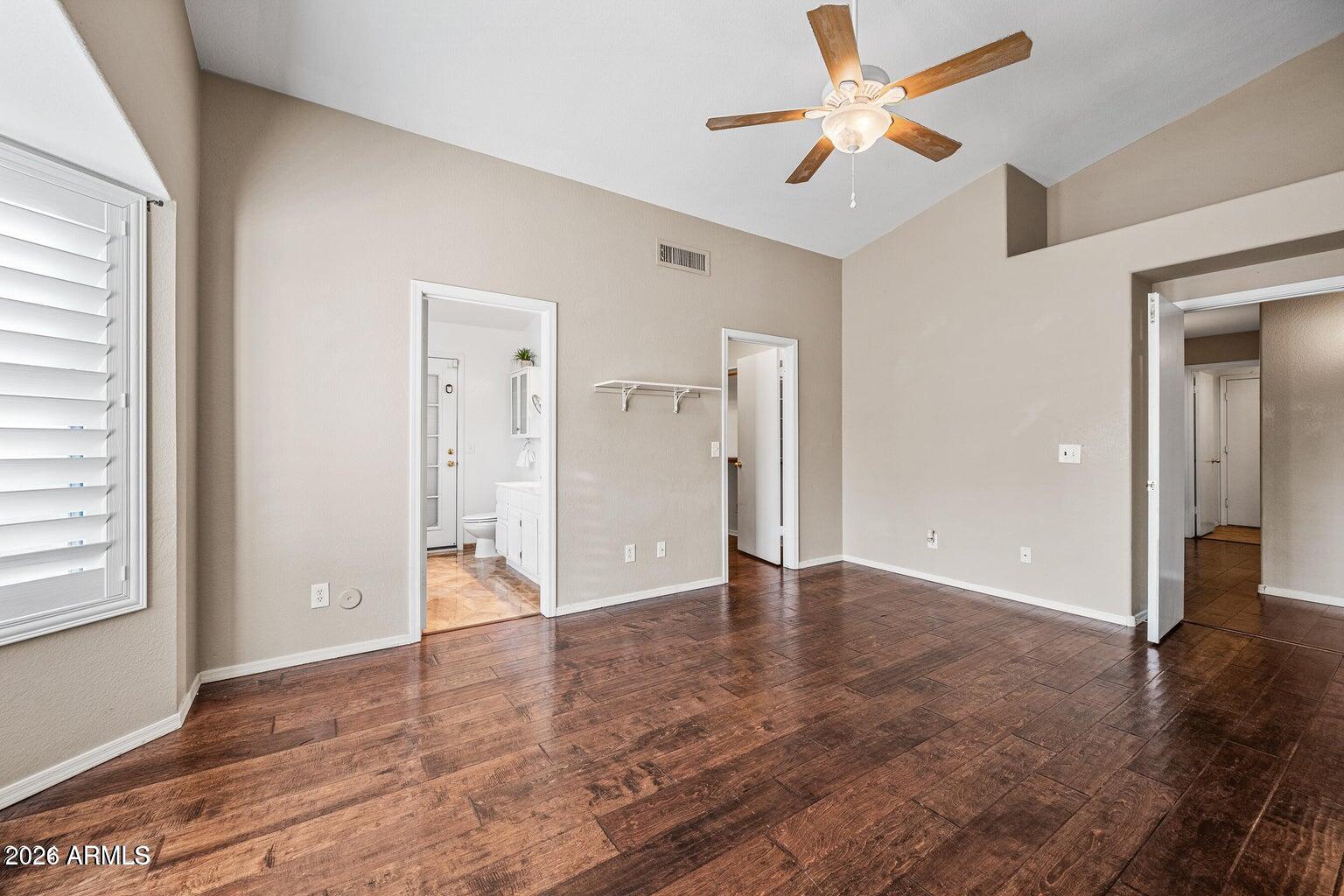 473 West Smoke Tree Road Gilbert, AZ 85233 - Photo 23 of 43 wooden floor in an empty room with a window