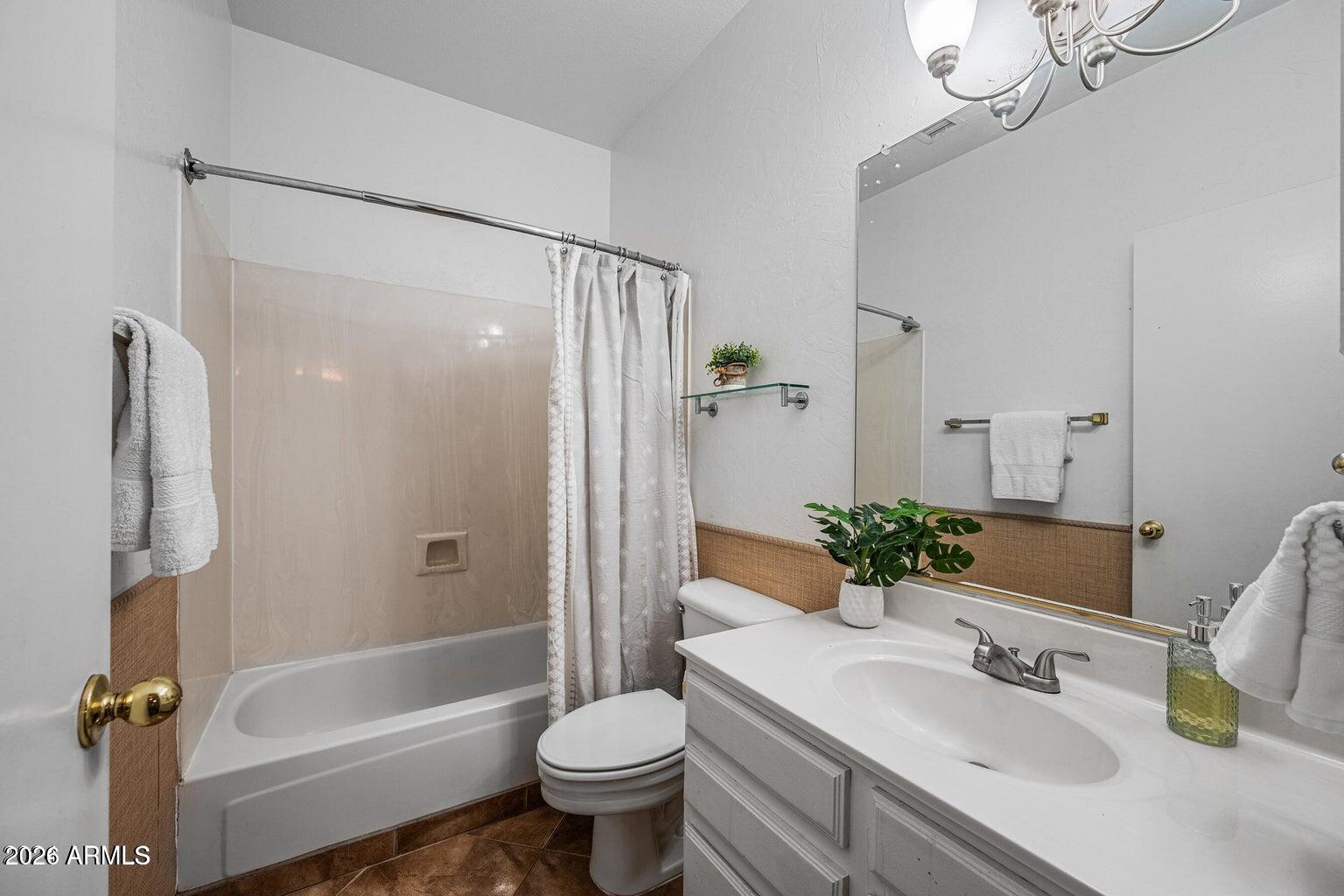 473 West Smoke Tree Road Gilbert, AZ 85233 - Photo 30 of 43 a bathroom with a sink toilet and shower