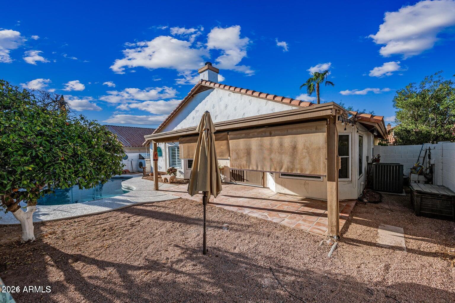 473 West Smoke Tree Road Gilbert, AZ 85233 - Photo 34 of 43 a house view with a backyard space