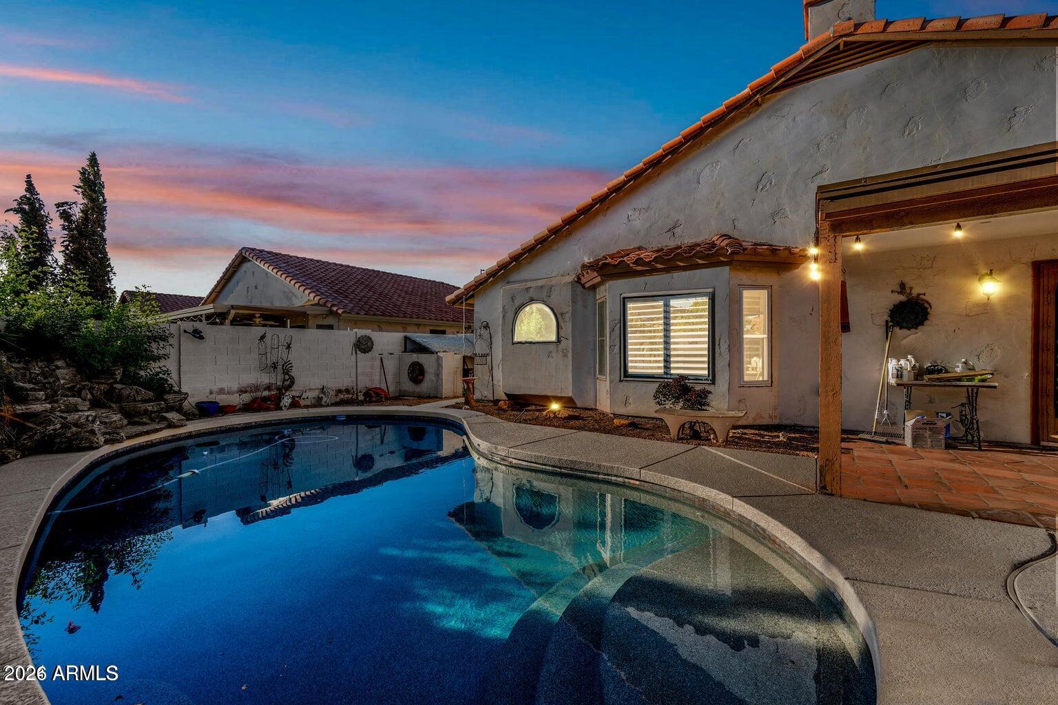 473 West Smoke Tree Road Gilbert, AZ 85233 - Photo 37 of 43 a front view of house with outdoor seating space
