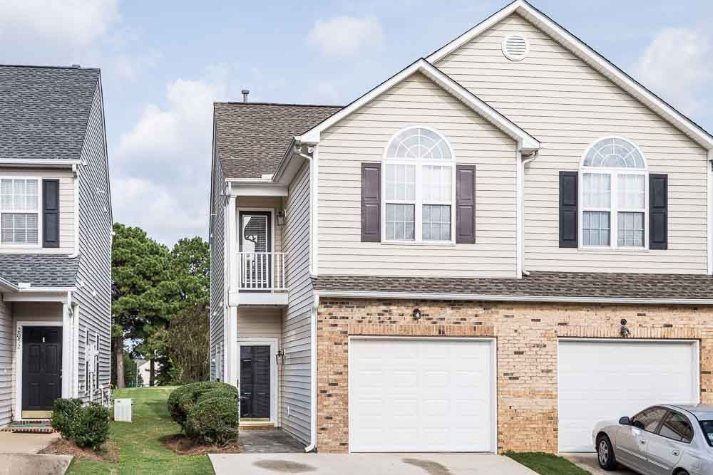 2044 Persimmon Ridge Drive Raleigh, NC 27604 - Photo 1 of 30 One car garage townhouse with two car driveway in popular Hedingham! 2044 Persimmon Ridge Drive