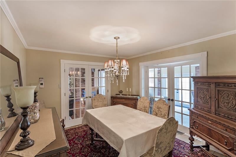 3835 Hills Church Road Export, PA 15632 - Photo 11 of 25 Spacious dining room with French doors leading to the Family Room, Sunroom and Kitchen.