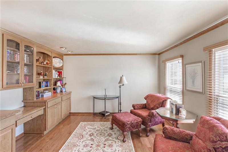3835 Hills Church Road Export, PA 15632 - Photo 12 of 25 This living room with beautiful hardwood floors could also double as an office or play room.