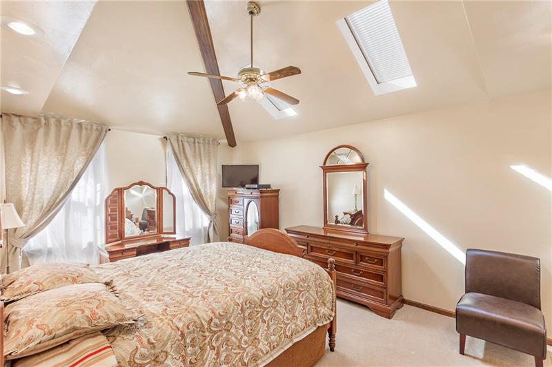 3835 Hills Church Road Export, PA 15632 - Photo 13 of 25 Master Bedroom with vaulted ceilings and skylight.